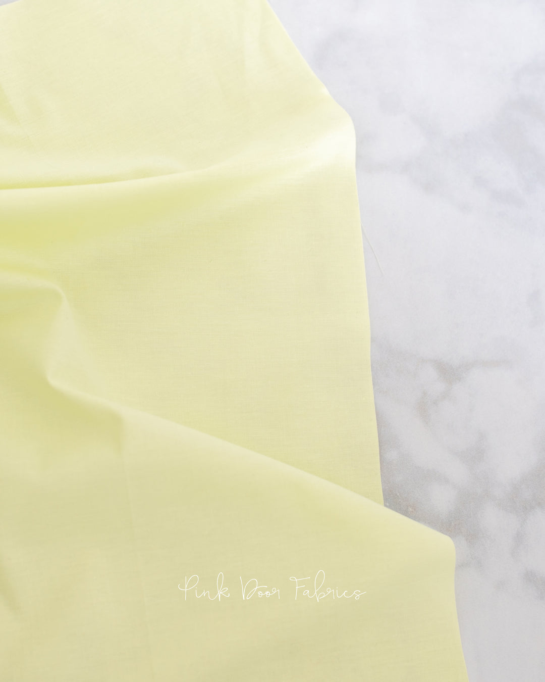 Cotton quilting fabric pattern called 'Unicorn Poop in Lemondrop'. Part of the 'True Colors' fabric collection. Designed by Tula Pink for fabric company Free Spirit Fabrics. SKU: CSFSESS.LEMONDROP. 44-45 inch width.