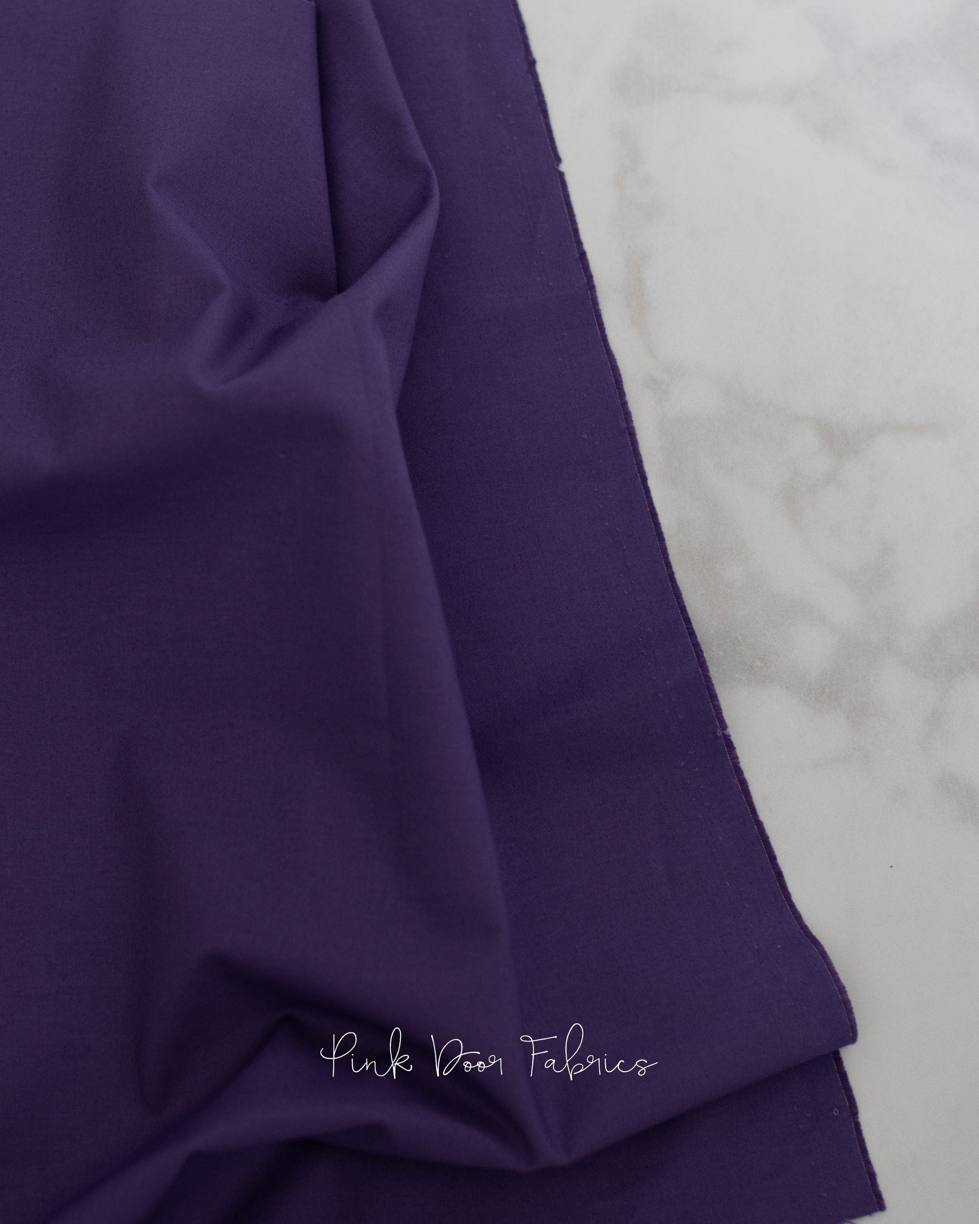 Cotton quilting fabric pattern called 'Dragon's Breath in Moonflower'. Part of the 'True Colors' fabric collection. Designed by Tula Pink for fabric company Free Spirit Fabrics. SKU: CSFSESS.MOONFLOWER. 44-45 inch width.