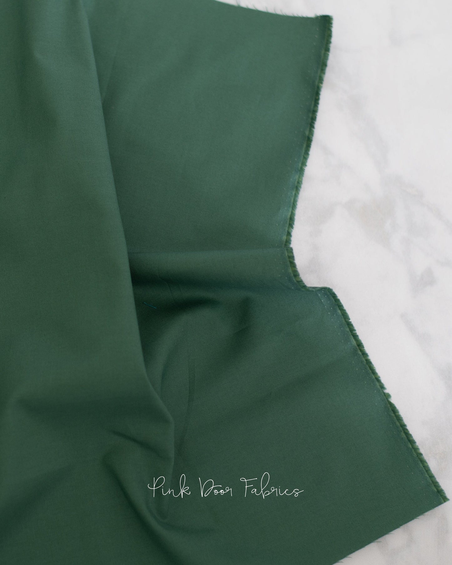 Cotton quilting fabric pattern called 'Dragon's Breath in Shire'. Part of the 'True Colors' fabric collection. Designed by Tula Pink for fabric company Free Spirit Fabrics. SKU: CSFSESS.SHIRE. 44-45 inch width.