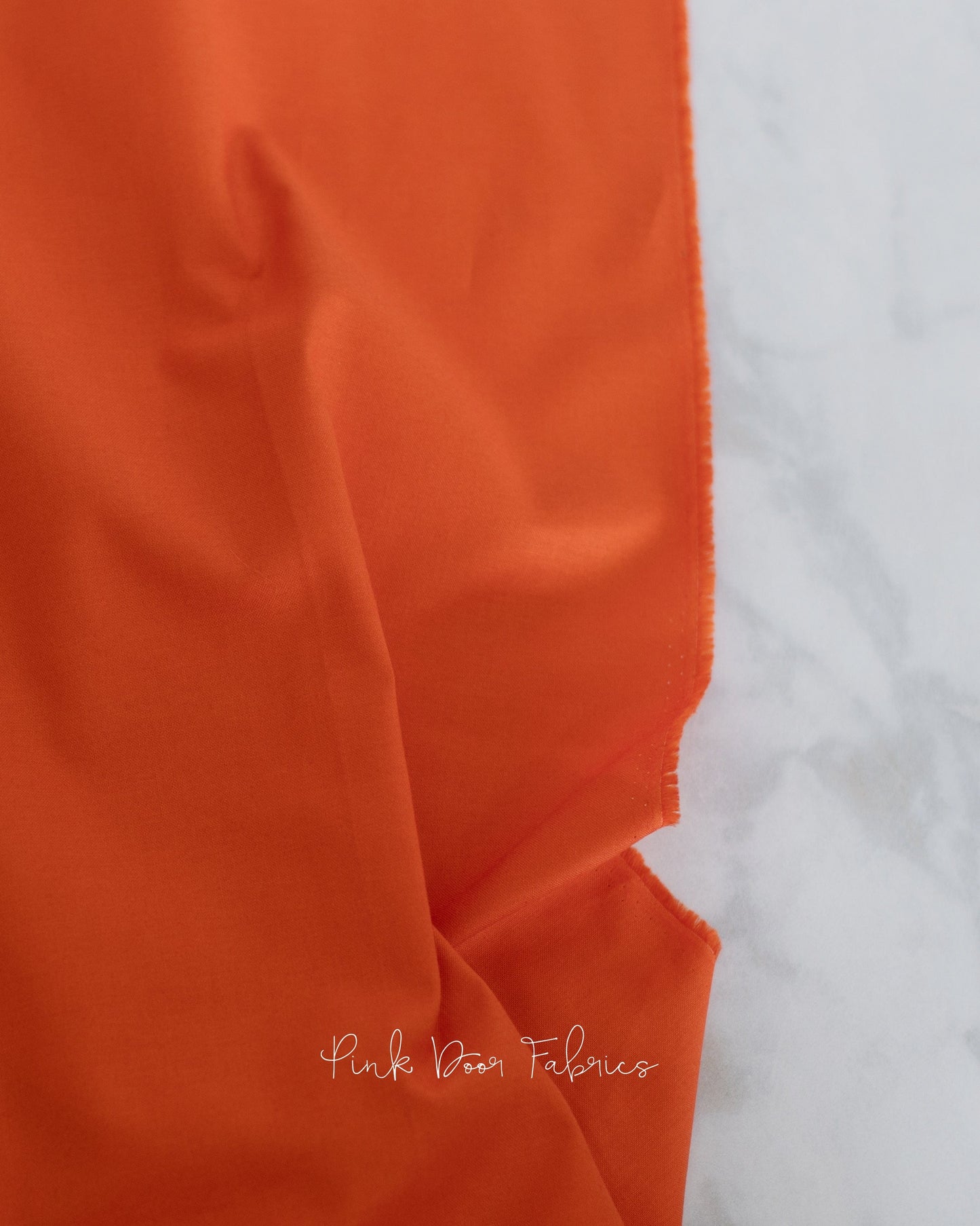 Cotton quilting fabric pattern called 'Dragon's Breath in Snapdragon'. Part of the 'True Colors' fabric collection. Designed by Tula Pink for fabric company Free Spirit Fabrics. SKU: CSFSESS.SNAPDRAGON. 44-45 inch width.