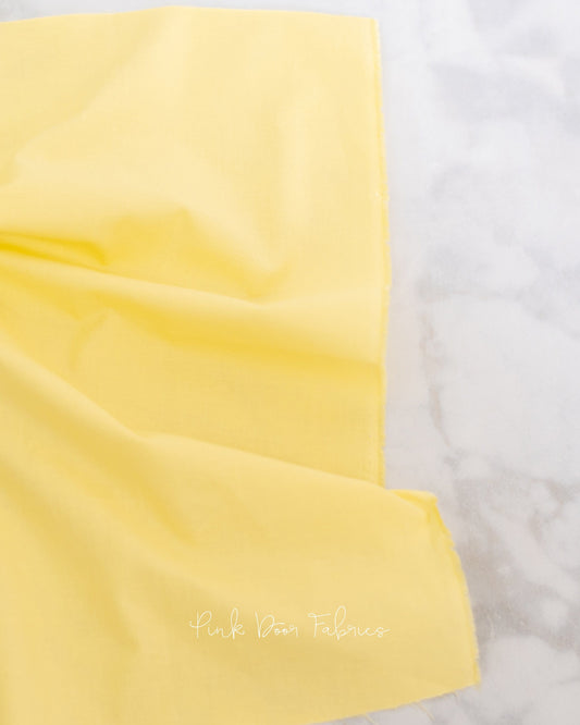 Cotton quilting fabric pattern called 'Unicorn Poop in Twinkle'. Part of the 'True Colors' fabric collection. Designed by Tula Pink for fabric company Free Spirit Fabrics. SKU: CSFSESS.TWINKLE. 44-45 inch width.