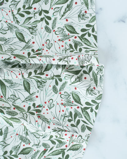 Cotton quilting fabric pattern called 'Winter Foliage in Natural'. Part of the 'Cheer & Merriment' fabric collection. Designed by Fancy That Design House for fabric company Moda Fabrics. SKU: 45534 11. 44-45 inch width.