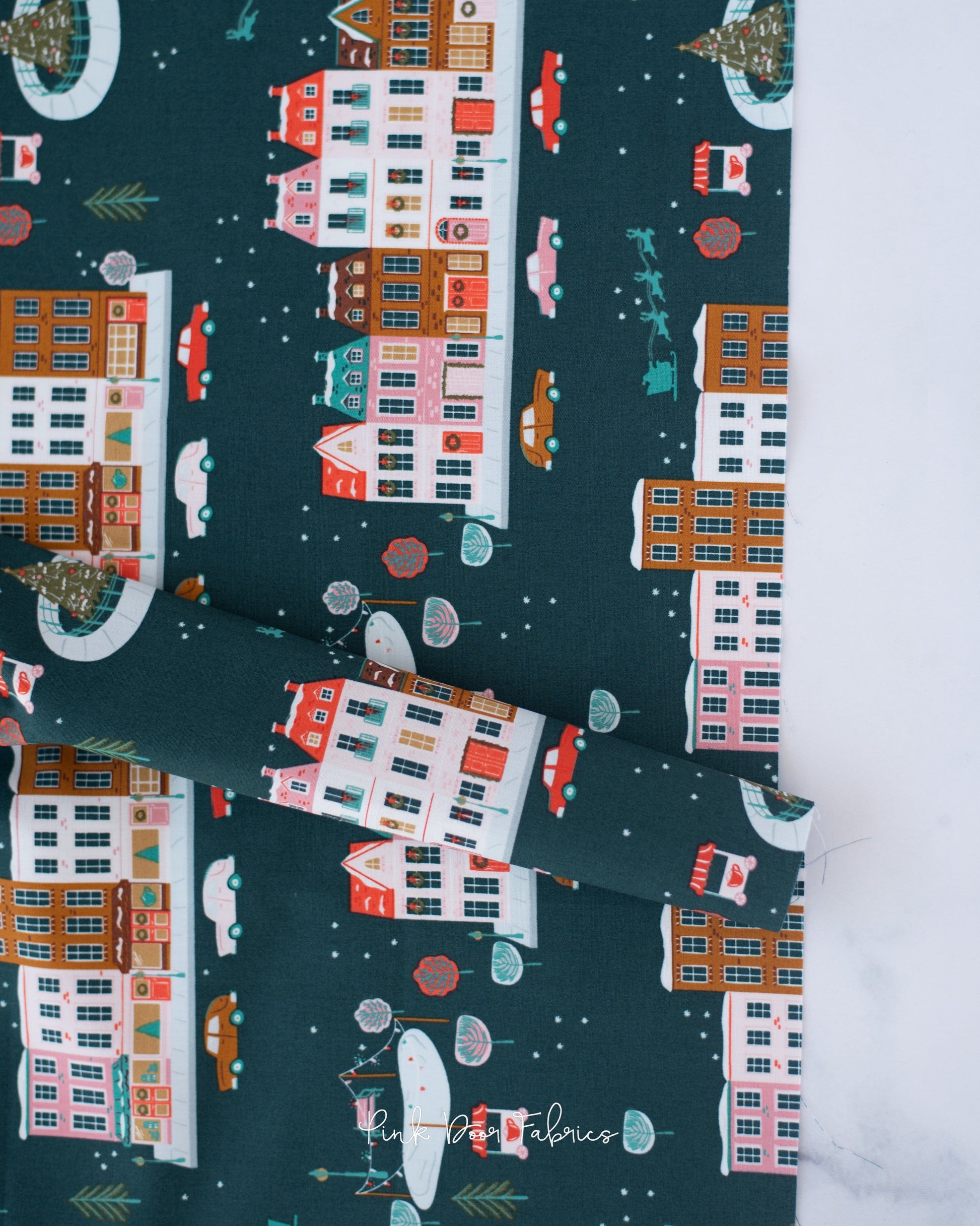 Cotton quilting fabric pattern called 'Joyful Boulevard in Night'. Part of the 'Christmas in the City' fabric collection. Designed by AGF Studio for fabric company Art Gallery Fabrics. SKU: CHC25812. 44-45 inch width.