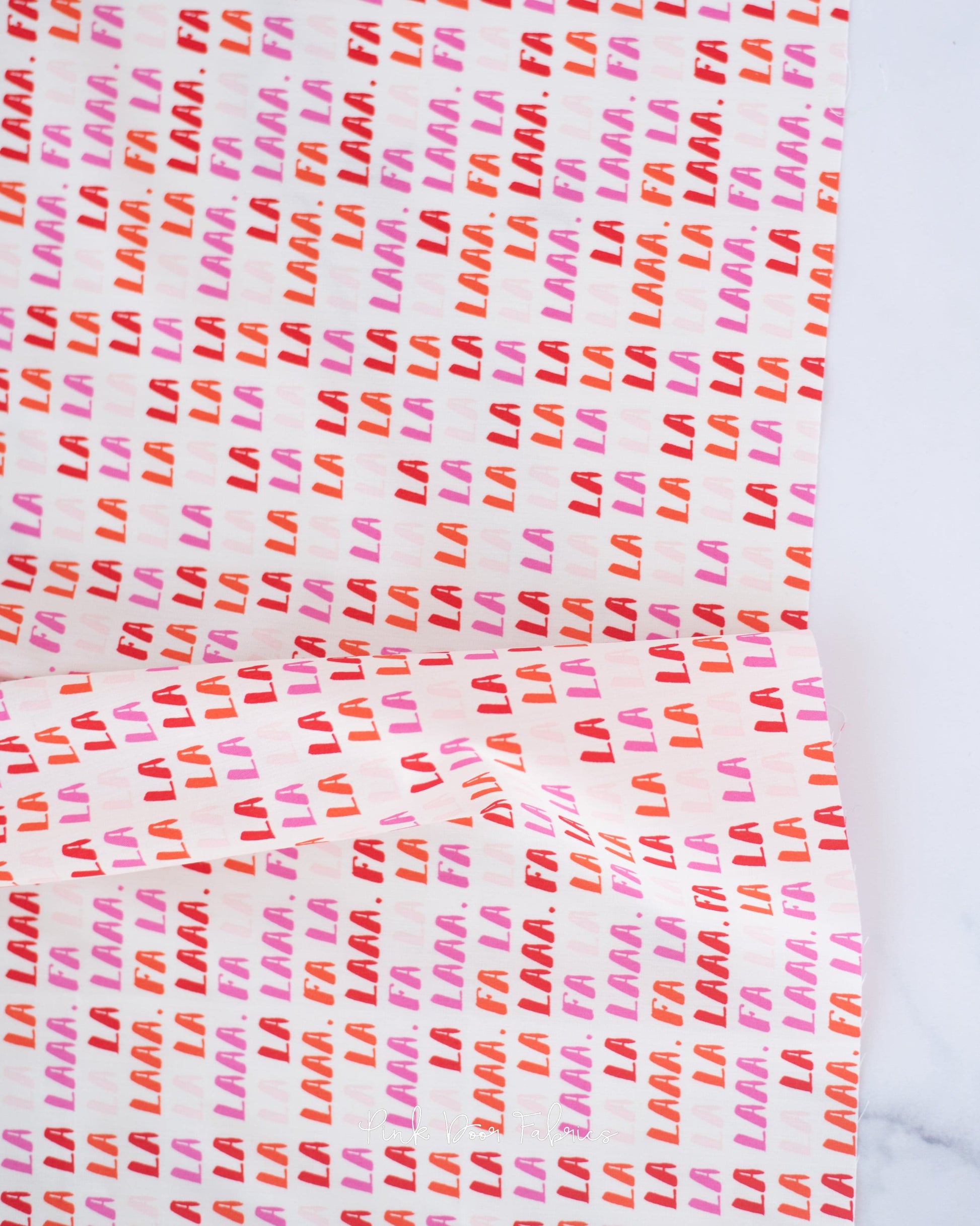 Cotton quilting fabric pattern called 'Fa La La'. Part of the 'Christmas in the City' fabric collection. Designed by AGF Studio for fabric company Art Gallery Fabrics. SKU: CHC25805. 44-45 inch width.