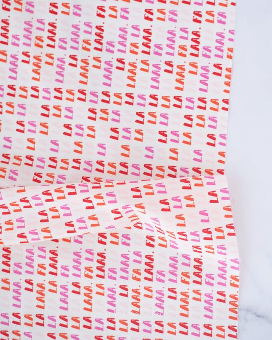 Cotton quilting fabric pattern called 'Fa La La'. Part of the 'Christmas in the City' fabric collection. Designed by AGF Studio for fabric company Art Gallery Fabrics. SKU: CHC25805. 44-45 inch width.