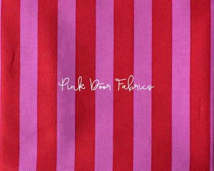 Cotton quilting fabric pattern called 'Tent Stripe in Peony'. Part of the 'True Colors' fabric collection. Designed by Tula Pink for fabric company Free Spirit Fabrics. SKU: PWTP069.PEONY. 44-45 inch width.