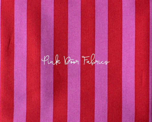 Cotton quilting fabric pattern called 'Tent Stripe in Peony'. Part of the 'True Colors' fabric collection. Designed by Tula Pink for fabric company Free Spirit Fabrics. SKU: PWTP069.PEONY. 44-45 inch width.