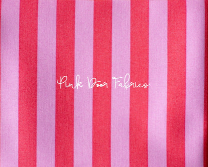 Cotton quilting fabric pattern called 'Tent Stripe in Poppy'. Part of the 'True Colors' fabric collection. Designed by Tula Pink for fabric company Free Spirit Fabrics. SKU: PWTP069.POPPY. 44-45 inch width.