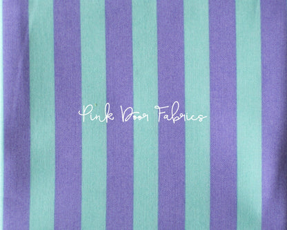 Cotton quilting fabric pattern called 'Tent Stripe in Petunia'. Part of the 'True Colors' fabric collection. Designed by Tula Pink for fabric company Free Spirit Fabrics. SKU: PWTP069.PETUNIA. 44-45 inch width.