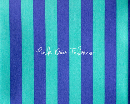 Cotton quilting fabric pattern called 'Tent Stripe in Iris'. Part of the 'True Colors' fabric collection. Designed by Tula Pink for fabric company Free Spirit Fabrics. SKU: PWTP069.IRIS. 44-45 inch width.