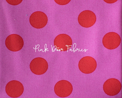 Cotton quilting fabric pattern called 'Pom Poms in Peony'. Part of the 'True Colors' fabric collection. Designed by Tula Pink for fabric company Free Spirit Fabrics. SKU: PWTP118.PEONY. 44-45 inch width.