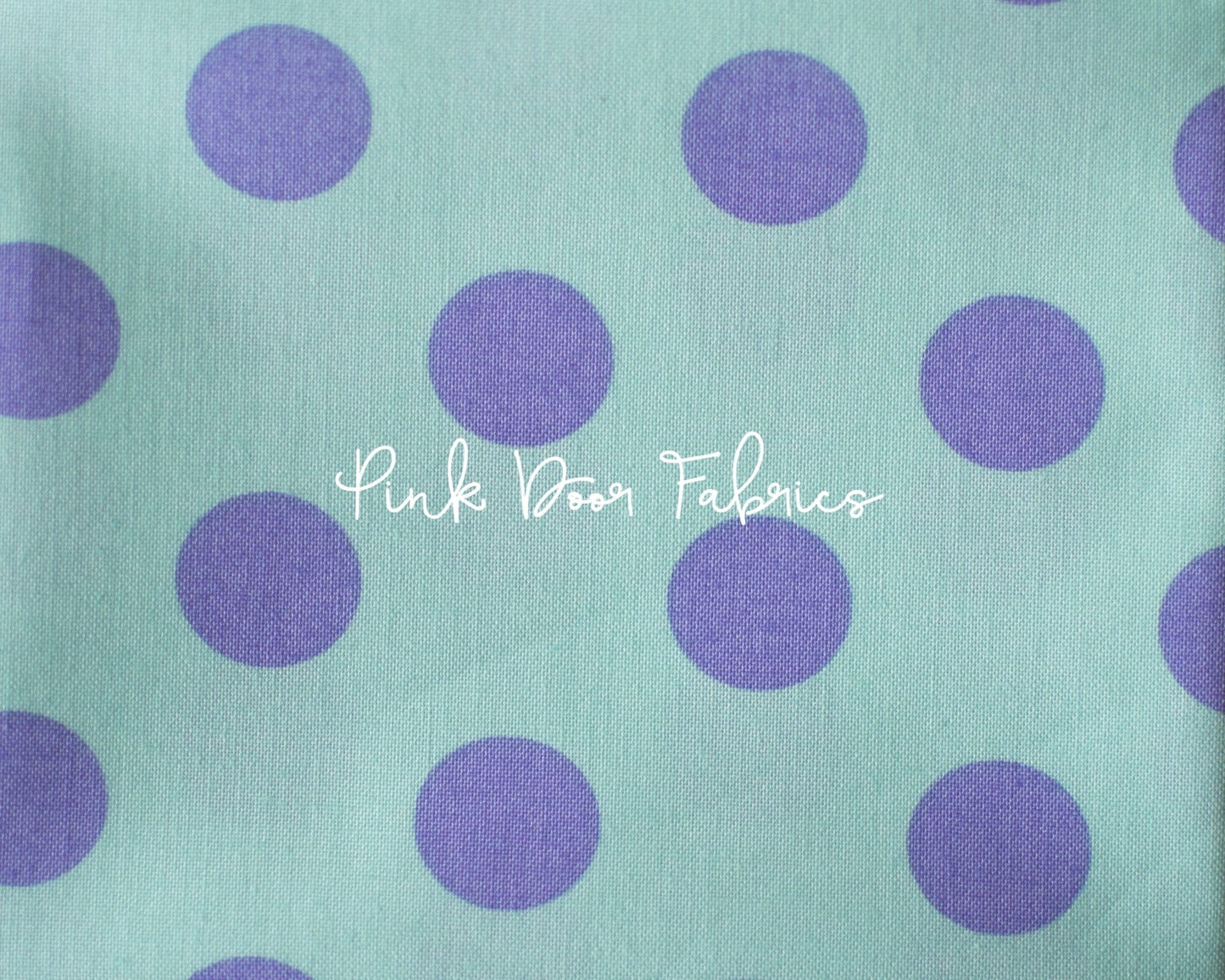 Cotton quilting fabric pattern called 'Pom Poms in Petunia'. Part of the 'True Colors' fabric collection. Designed by Tula Pink for fabric company Free Spirit Fabrics. SKU: PWTP118.PETUNIA. 44-45 inch width.
