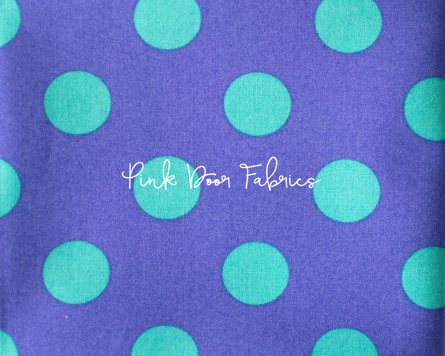Cotton quilting fabric pattern called 'Pom Poms in Iris'. Part of the 'True Colors' fabric collection. Designed by Tula Pink for fabric company Free Spirit Fabrics. SKU: PWTP118.IRIS. 44-45 inch width.