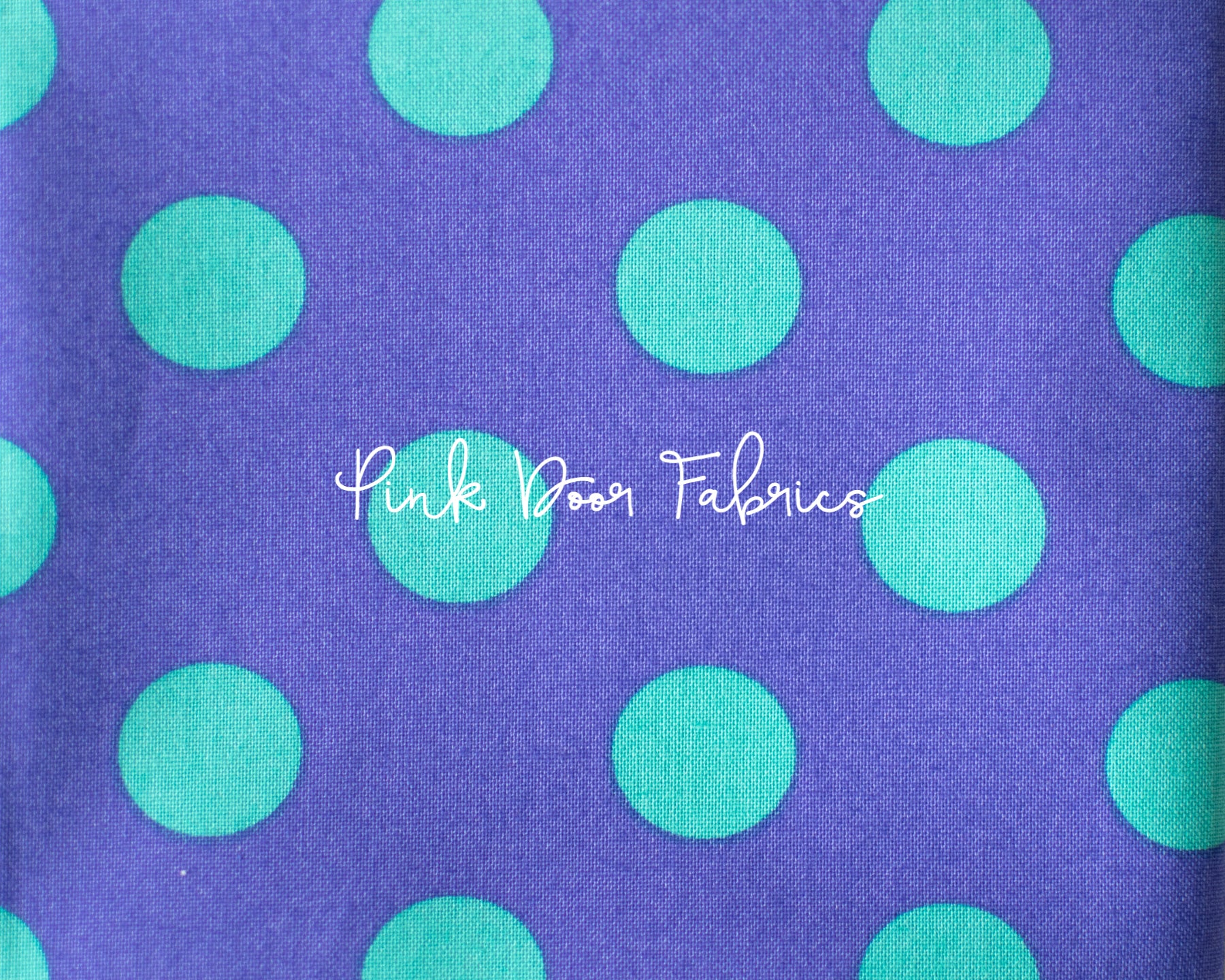 Cotton quilting fabric pattern called 'Pom Poms in Iris'. Part of the 'True Colors' fabric collection. Designed by Tula Pink for fabric company Free Spirit Fabrics. SKU: PWTP118.IRIS. 44-45 inch width.