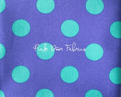 Cotton quilting fabric pattern called 'Pom Poms in Iris'. Part of the 'True Colors' fabric collection. Designed by Tula Pink for fabric company Free Spirit Fabrics. SKU: PWTP118.IRIS. 44-45 inch width.