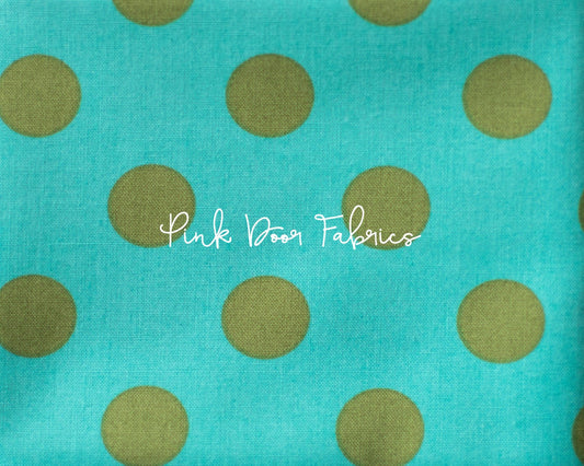 Cotton quilting fabric pattern called 'Pom Poms in Agave'. Part of the 'True Colors' fabric collection. Designed by Tula Pink for fabric company Free Spirit Fabrics. SKU: PWTP118.AGAVE. 44-45 inch width.