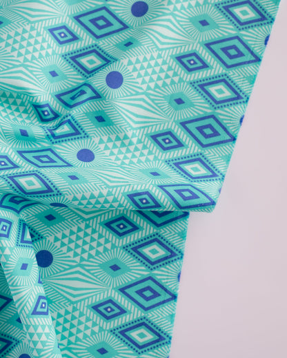 Cotton quilting fabric pattern called 'Lucy in Lagoon'. Part of the 'Daydreamer' fabric collection. Designed by Tula Pink for fabric company Free Spirit Fabrics. SKU: PWTP096.LAGOON. 44-45 inch width.