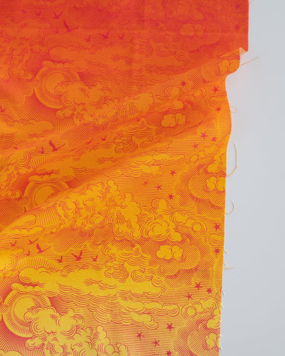 Cotton quilting fabric pattern called 'Little Fluffy Clouds in Mango'. Part of the 'Daydreamer' fabric collection. Designed by Tula Pink for fabric company Free Spirit Fabrics. SKU: PWTP177.MANGO. 44-45 inch width.