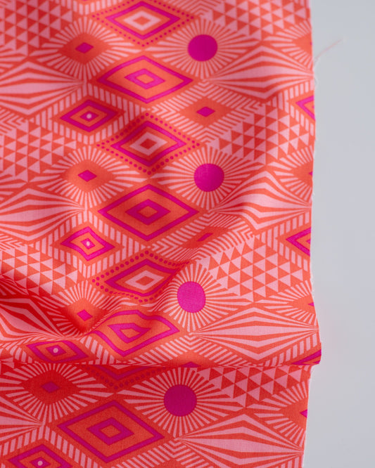 Cotton quilting fabric pattern called 'Lucy in Dragonfruit'. Part of the 'Daydreamer' fabric collection. Designed by Tula Pink for fabric company Free Spirit Fabrics. SKU: PWTP096.DRAGONFRUIT. 44-45 inch width.