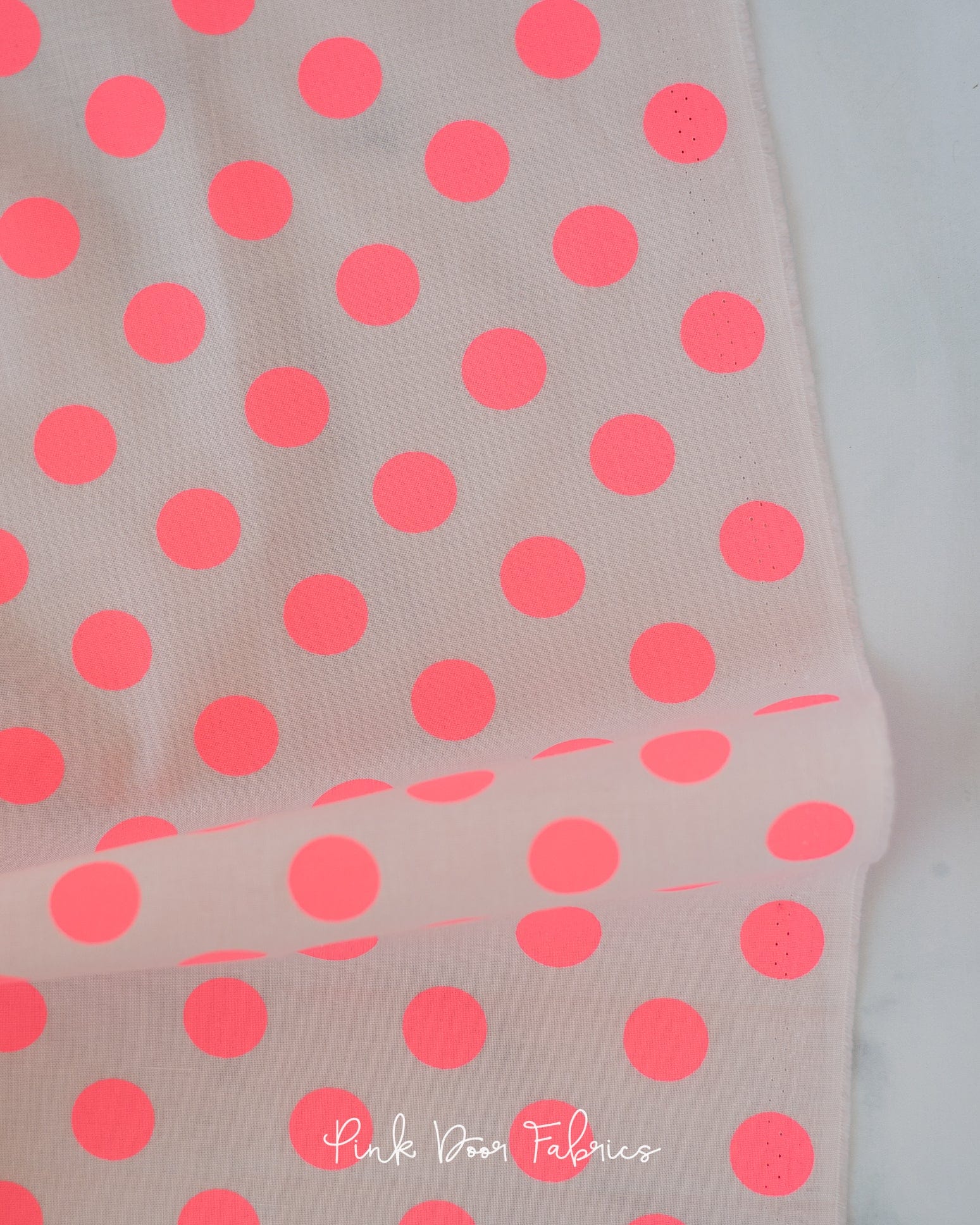 Cotton quilting fabric pattern called 'Pom Poms in Nova'. Part of the '2023 True Colors' fabric collection. Designed by Tula Pink for fabric company Free Spirit Fabrics. SKU: PWTP118.NOVA. 44-45 inch width.