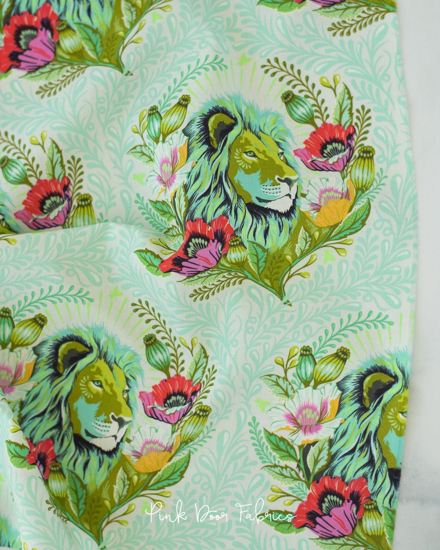 Cotton quilting fabric pattern called 'Good Hair Day in Karma'. Part of the 'Everglow' fabric collection. Designed by Tula Pink for fabric company Free Spirit Fabrics. SKU: PWTP201.KARMA. 44-45 inch width.