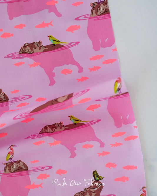 Cotton quilting fabric pattern called 'My Hippos Don't Lie in Nova'. Part of the 'Everglow' fabric collection. Designed by Tula Pink for fabric company Free Spirit Fabrics. SKU: PWTP204.NOVA. 44-45 inch width.
