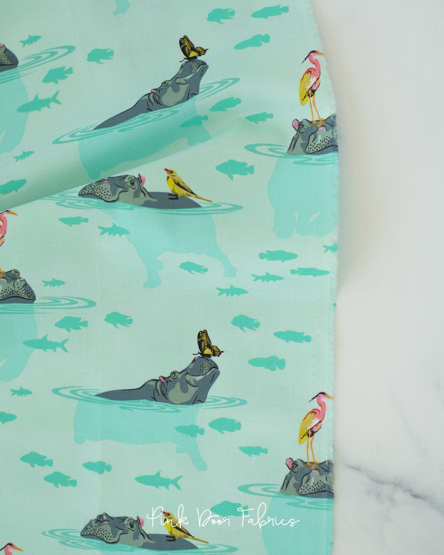 Cotton quilting fabric pattern called 'My Hippos Don't Lie in Spirit'. Part of the 'Everglow' fabric collection. Designed by Tula Pink for fabric company Free Spirit Fabrics. SKU: PWTP204.SPIRIT. 44-45 inch width.
