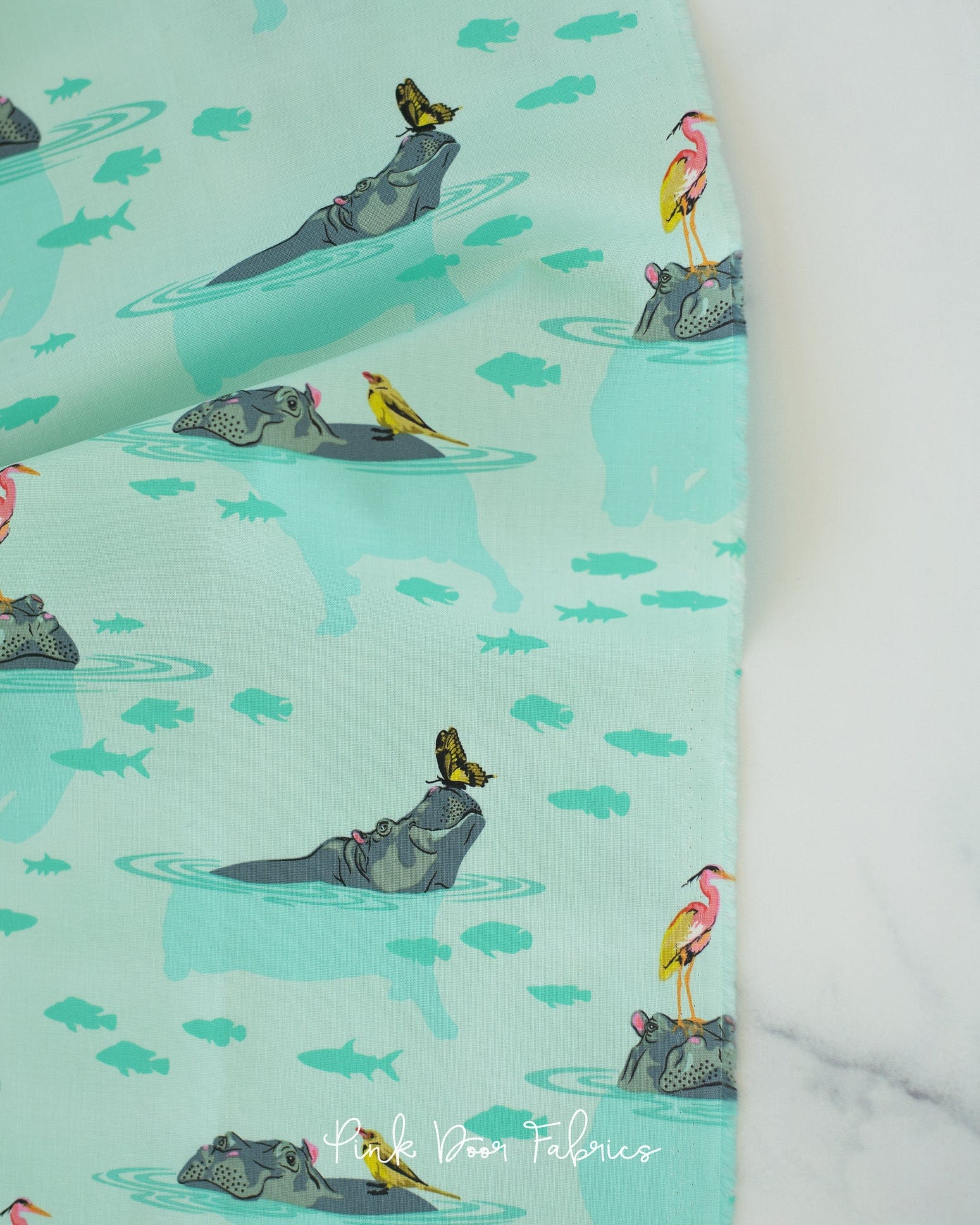 Cotton quilting fabric pattern called 'My Hippos Don't Lie in Spirit'. Part of the 'Everglow' fabric collection. Designed by Tula Pink for fabric company Free Spirit Fabrics. SKU: PWTP204.SPIRIT. 44-45 inch width.
