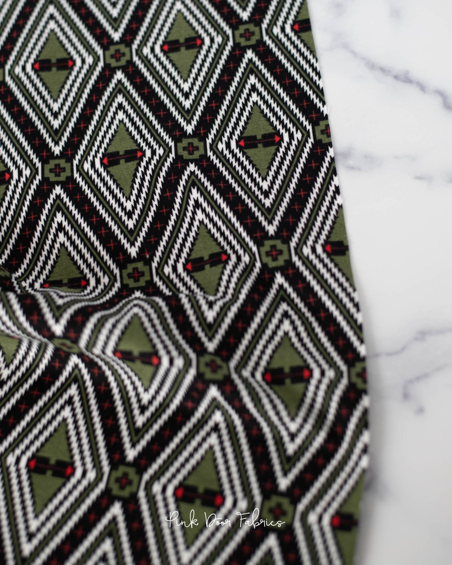 Cotton flannel quilting fabric pattern called 'Family Tree in Pine Fresh'. Part of the 'Holiday Homies flannel' fabric collection. Designed by Tula Pink for the Free Spirit Fabrics fabric company. SKU: FNTP004.PINEFRESH. 44-45 inch width.