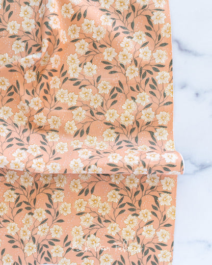Cotton quilting fabric pattern called 'Wild Vines in Peach'. Part of the 'Get Out and Explore' fabric collection. Designed by Mint Tulip for fabric company Cotton + Steel. SKU: MT101-PE2. 44-45 inch width.