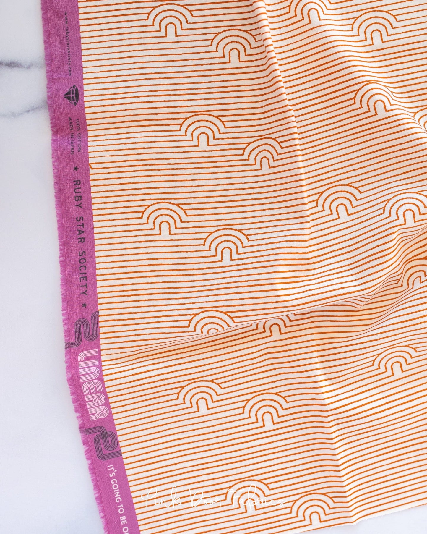 Cotton quilting fabric pattern called 'Caves in Saddle'. Part of the 'Linear' fabric collection. Designed by Rashida Coleman Hale for fabric company Moda Fabrics. SKU: RS1053 15. 44-45 inch width.