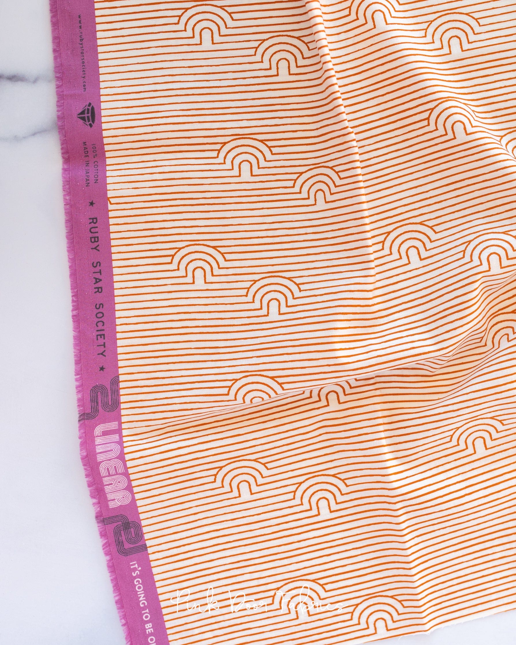 Cotton quilting fabric pattern called 'Caves in Saddle'. Part of the 'Linear' fabric collection. Designed by Rashida Coleman Hale for fabric company Moda Fabrics. SKU: RS1053 15. 44-45 inch width.