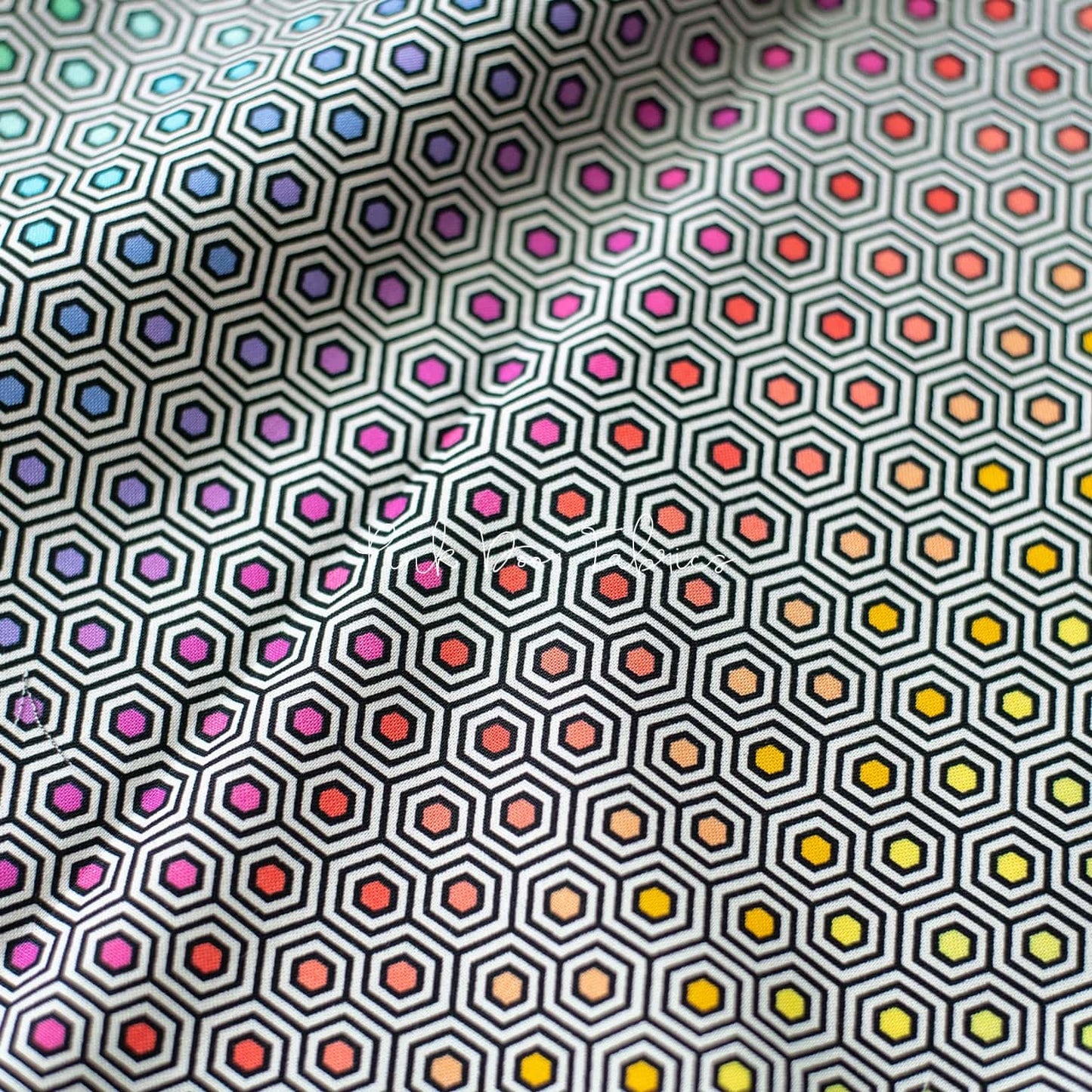 Cotton quilting fabric pattern called 'Hexy Rainbow in Ink'. Part of the 'Linework' fabric collection. Designed by Tula Pink for fabric company Free Spirit Fabrics. SKU: PWTP151.INK. 44-45 inch width.