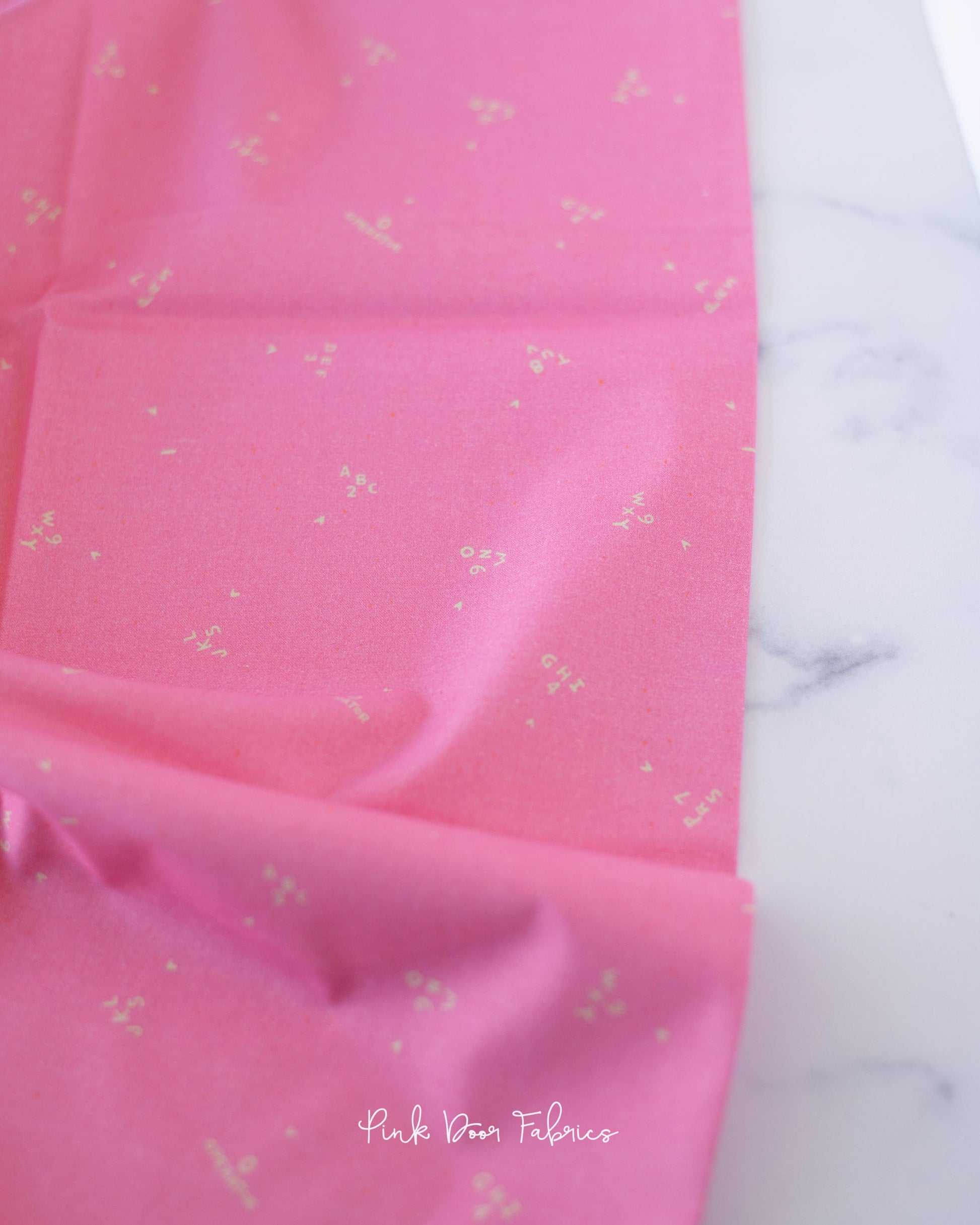 Cotton quilting fabric pattern called 'Numbers'. Part of the '9 to 5' fabric collection. Designed by Lisa Flowers for fabric company Paintbrush Studio Fabrics. SKU: 120-22494. 44-45 inch width.