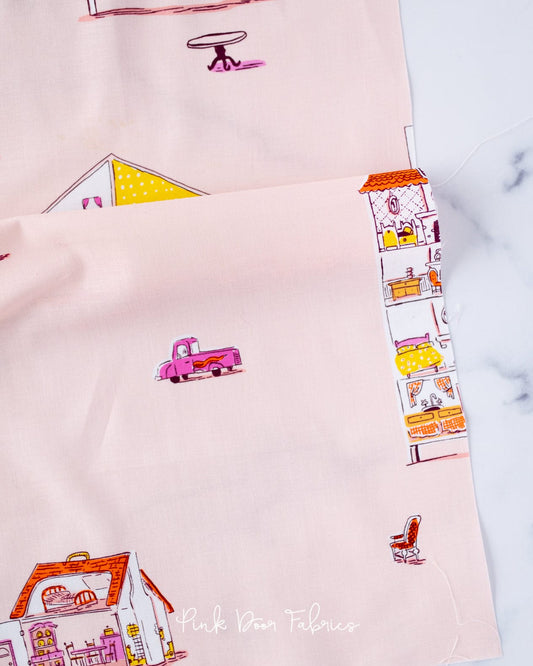 Cotton quilting fabric pattern called 'Dollhouse in Blush'. Part of the 'Lucky Rabbit' fabric collection. Designed by Heather Ross for fabric company Windham Fabrics. SKU: 53241-3. 44-45 inch width.