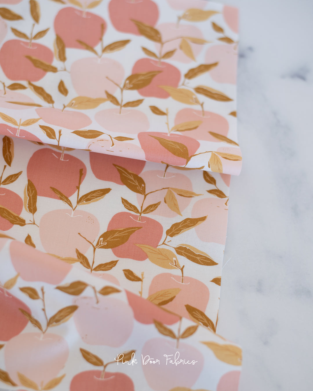 Cotton quilting fabric pattern called 'Enchanted Apple in Mint Blush'. Part of the 'Midnight in the Garden' fabric collection. Designed by Fancy That Design House & Co. for fabric company Moda Fabrics. SKU: 43121 11. 44-45 inch width.