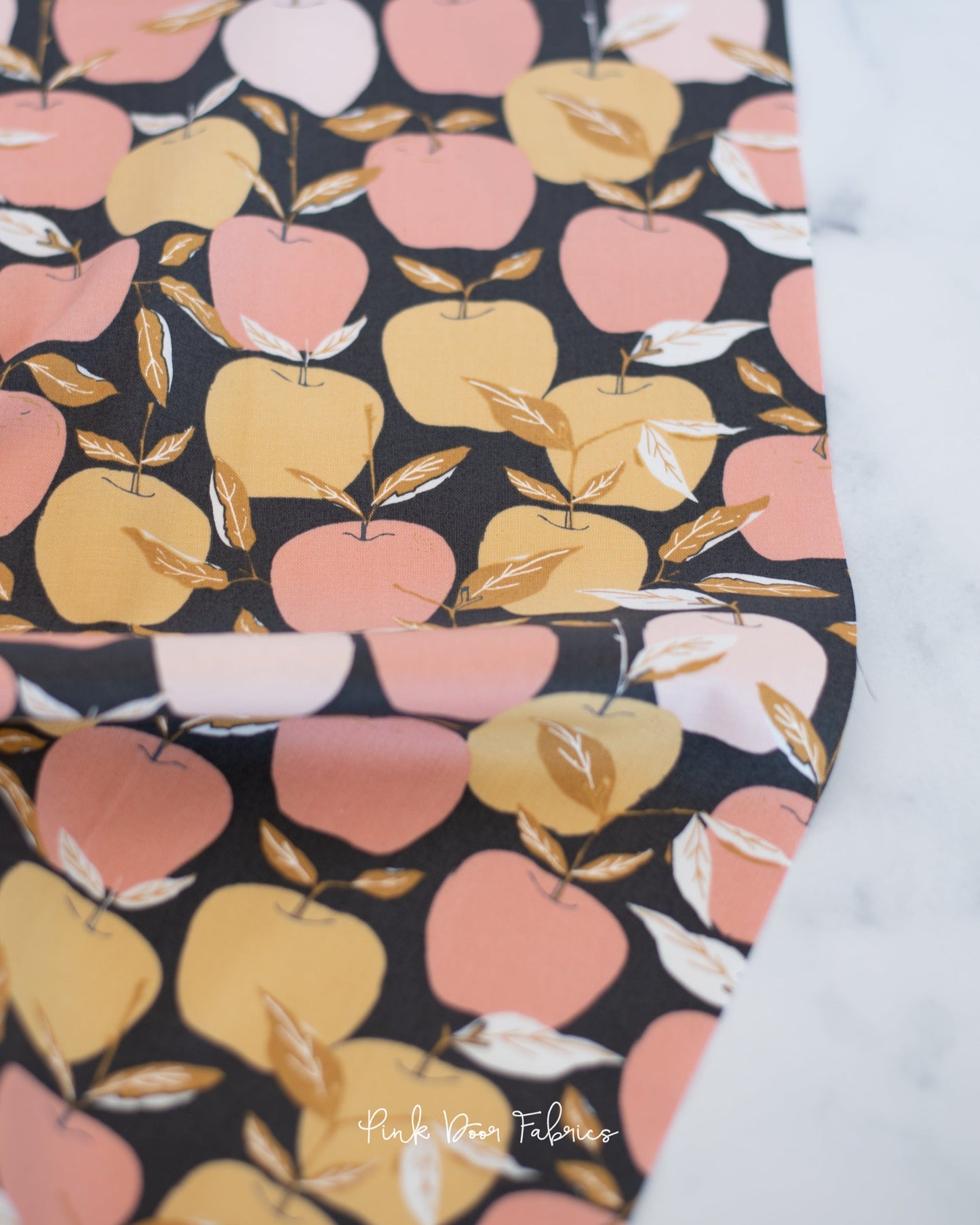 Cotton quilting fabric pattern called 'Enchanted Apple in Charcoal'. Part of the 'Midnight in the Garden' fabric collection. Designed by Fancy That Design House & Co. for fabric company Moda Fabrics. SKU: 43121 13. 44-45 inch width.
