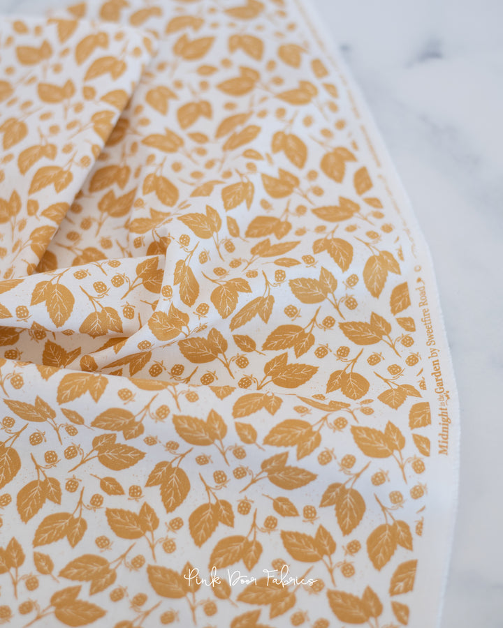 Cotton quilting fabric pattern called 'Blackberry Bramble in Gold'. Part of the 'Midnight in the Garden' fabric collection. Designed by Fancy That Design House & Co. for fabric company Moda Fabrics. SKU: 43125 11. 44-45 inch width.