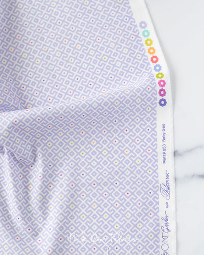 Cotton quilting fabric pattern called 'Baby Geo in Dusk'. Part of the 'Moon Garden' fabric collection. Designed by Tula Pink for fabric company Free Spirit Fabrics. SKU: PWTP053.DUSK. 44-45 inch width.