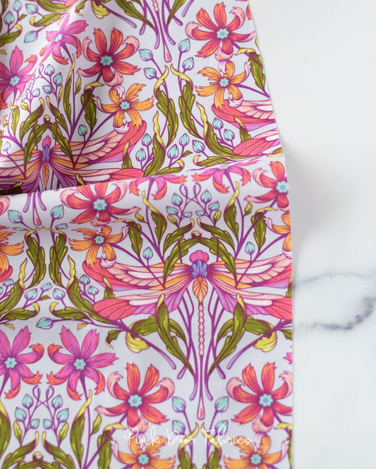 Cotton quilting fabric pattern called 'Dragon Your Feet in Dusk'. Part of the 'Moon Garden' fabric collection. Designed by Tula Pink for fabric company Free Spirit Fabrics. SKU: PWTP199.DUSK. 44-45 inch width.