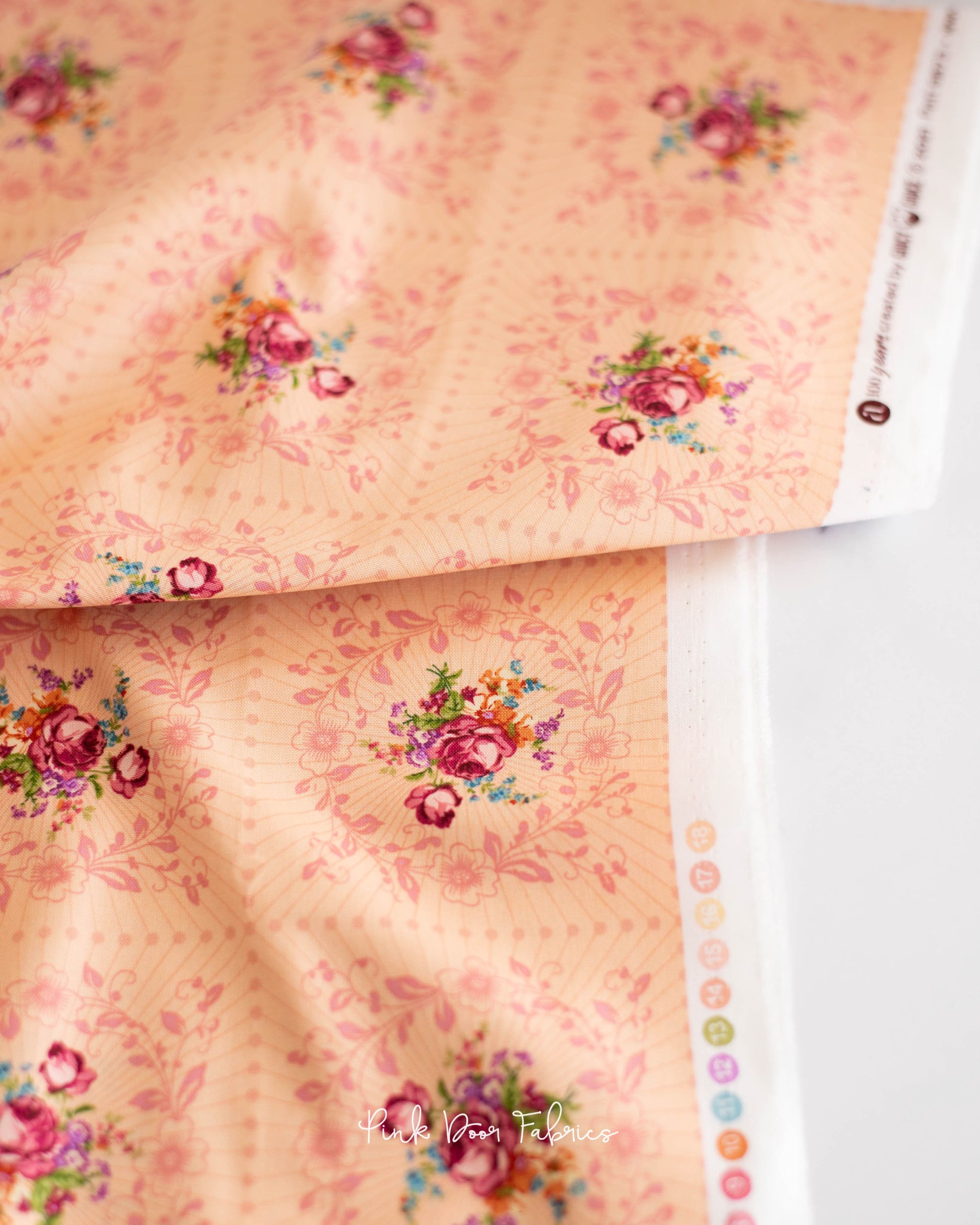 Cotton quilting fabric pattern called 'Wreath in Rosalia'. Part of the 'Nonna' fabric collection. Designed by Giucy Giuce for fabric company Andover Fabrics. SKU: A-9873-O. 44-45 inch width.