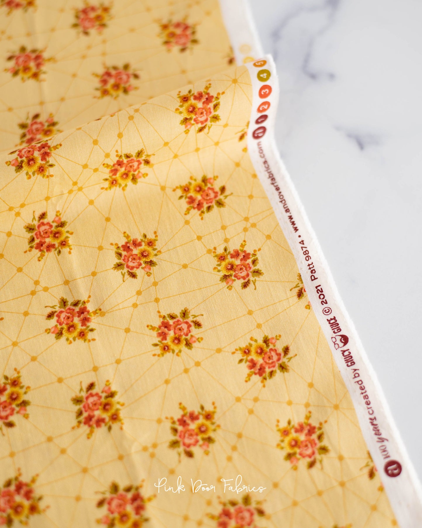 Cotton quilting fabric pattern called 'Little Bouquets in Cornflower'. Part of the 'Nonna' fabric collection. Designed by Giucy Giuce for fabric company Andover Fabrics. SKU: A-9874-Y. 44-45 inch width.