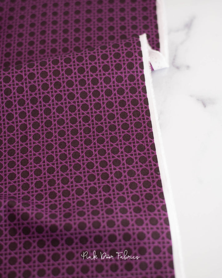 Cotton quilting fabric pattern called 'Caning in Fig'. Part of the 'Nonna' fabric collection. Designed by Giucy Giuce for fabric company Andover Fabrics. SKU: A-9876-P. 44-45 inch width.