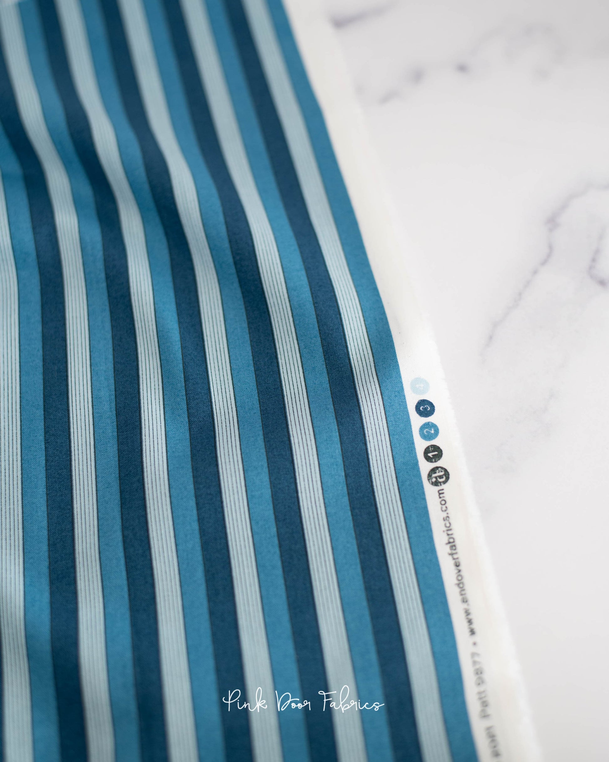 Cotton quilting fabric pattern called 'Onofrio in Shirt'. Part of the 'Nonna' fabric collection. Designed by Giucy Giuce for fabric company Andover Fabrics. SKU: A-9877-B. 44-45 inch width.