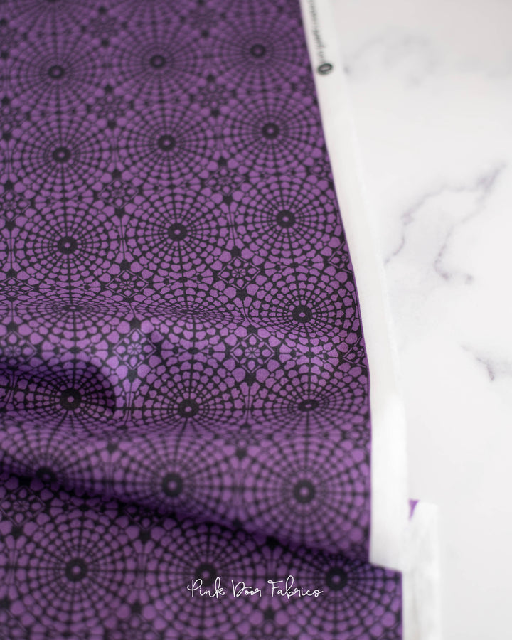 Cotton quilting fabric pattern called 'Lamp in Plum'. Part of the 'Nonna' fabric collection. Designed by Giucy Giuce for fabric company Andover Fabrics. SKU: A-9878-P. 44-45 inch width.
