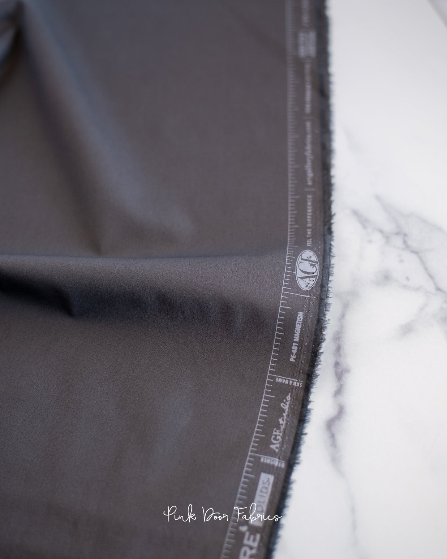 Cotton quilting fabric pattern called 'Magnetism'. Part of the 'Pure Solids' fabric collection. Designed by Art Gallery Fabrics for fabric company Art Gallery Fabrics. SKU: PE-481. 44-45 inch width.