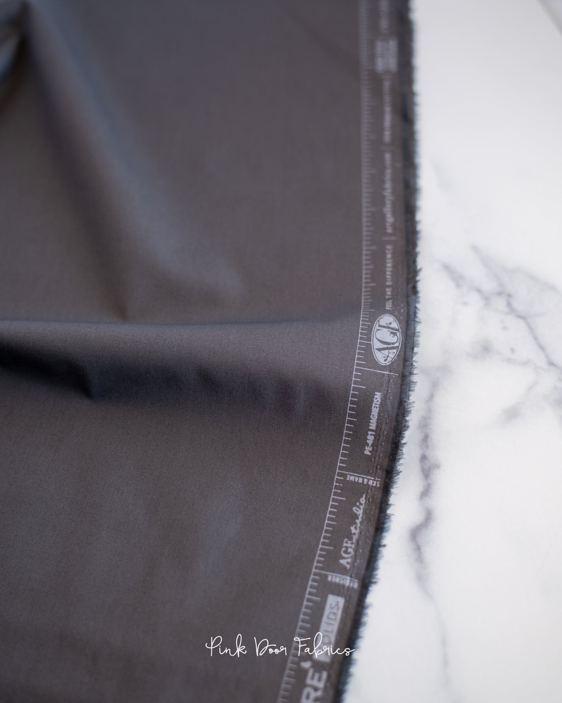 Cotton quilting fabric pattern called 'Magnetism'. Part of the 'Pure Solids' fabric collection. Designed by Art Gallery Fabrics for fabric company Art Gallery Fabrics. SKU: PE-481. 44-45 inch width.