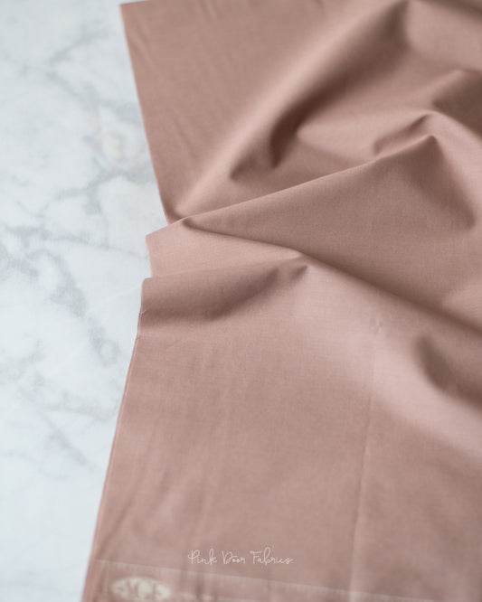 Cotton quilting fabric pattern called 'Potter's Clay'. Part of the 'Pure Solids' fabric collection. Designed by Art Gallery Fabrics for fabric company Art Gallery Fabrics. SKU: PE-507. 44-45 inch width.