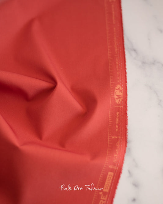 Cotton quilting fabric pattern called 'Desert Dunes'. Part of the 'Pure Solids' fabric collection. Designed by Art Gallery Fabrics for fabric company Art Gallery Fabrics. SKU: PE-521. 44-45 inch width.