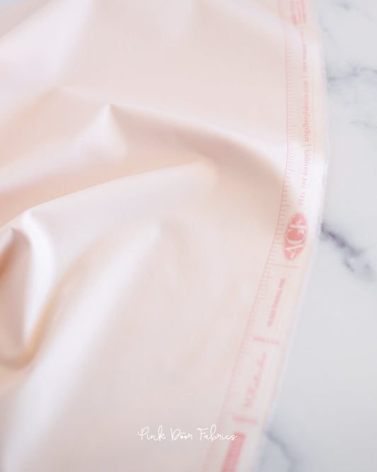 Cotton quilting fabric pattern called 'Ethereal Pink'. Part of the 'Pure Solids' fabric collection. Designed by Art Gallery Fabrics for fabric company Art Gallery Fabrics. SKU: PE-522. 44-45 inch width.